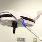 Tool being used to clean light