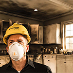 Odor Removal Services Employee with Mask on